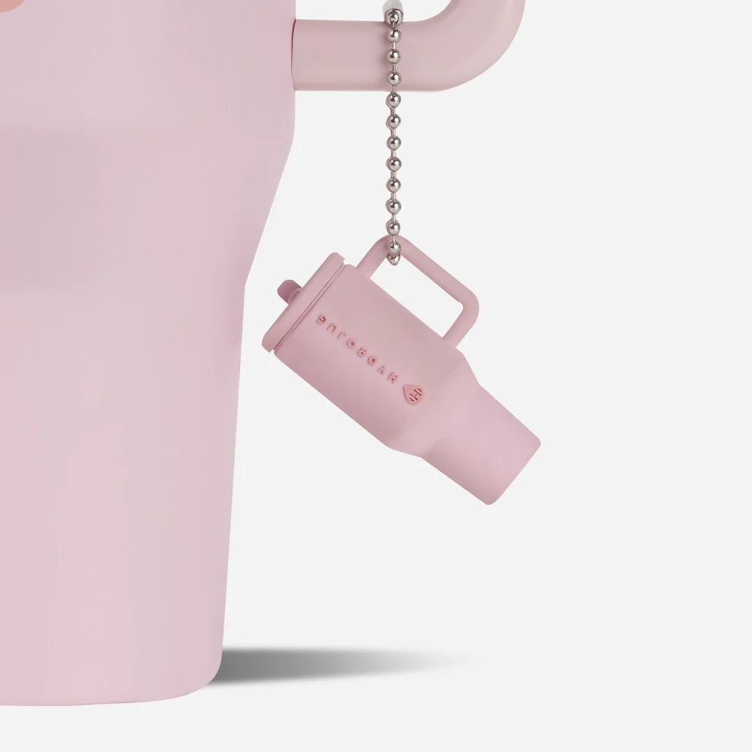 traveler-keychain-n1 Web-TravelerKeychainPhotos-PinkSand2.webp